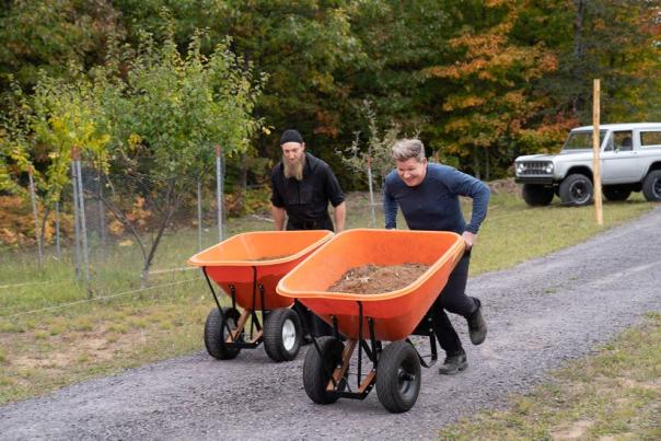 Gordon Rasmsay pushing a wheelbarrow in the Keweenaw