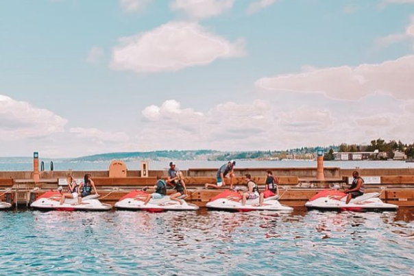Carillon Point dock with people on waverunners