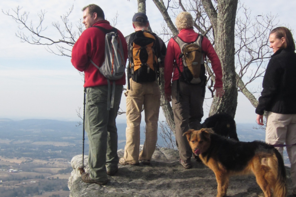 A group admires the view during a winter hike near Knoxville, TN.
