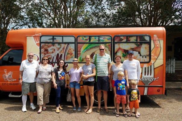 People Standing In Front Of A Food Truck In Lafayette, LA