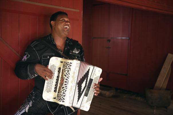 Chubby Carrier playing accordion