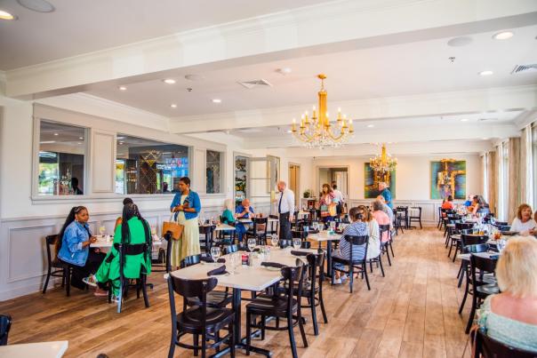 guest dine and walk around inside Pat's of Henderson Restaurant