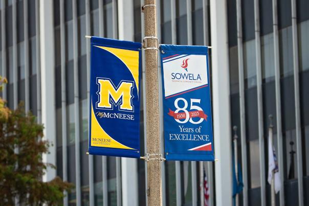 McNeese & SOWELA Welcome Back Flags in Downtown