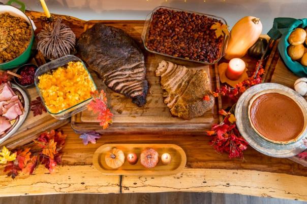 thanksgiving spread from paul's ribshack including brisket, turkey, ham, mac n cheese, rolls, gravy, dressing and decorations