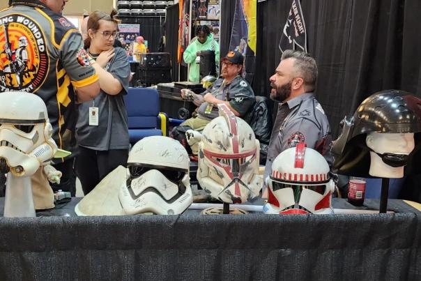 stormtrooper helmets and other Star Wars gear on display at CyPhaCon