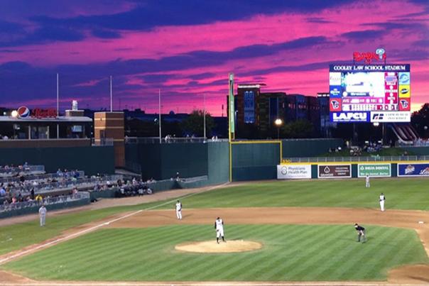 Jackson Field with baseball players at sunset