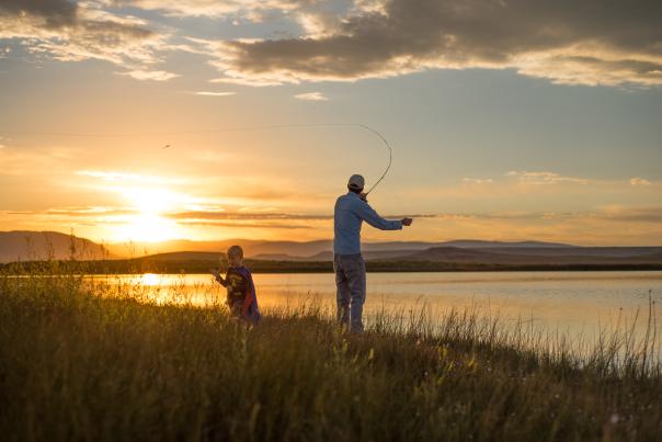 sunset fishing on a lake