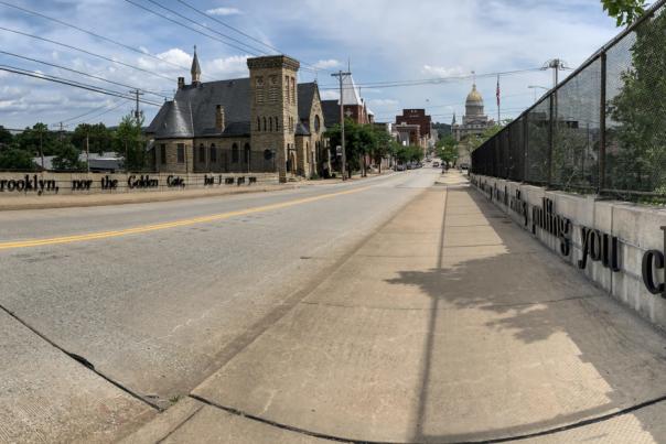 The first stanza of Joy Katz's poem, “BRIDGE BIRDS OF LEAST CONCERN,” is now on view on the North Main Street Bridge in downtown Greensburg.