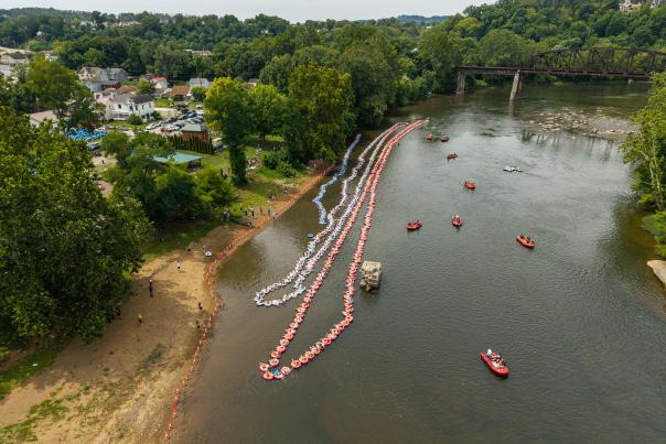 A Guinness World Record 645 swimming tubes line the Youghiogheny River on Saturday, Aug. 1, 2026, in Connellsville during the Tube da Ville event.