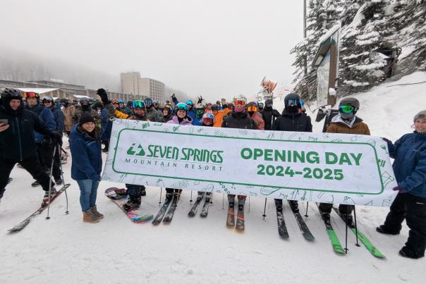 Skiers and snowboarders line up for the opening of the chairlift at Seven Springs Mountain Resort on Friday, Dec. 6, 2024.
