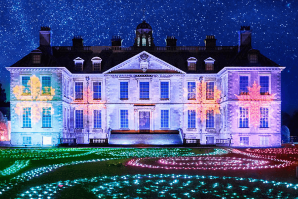 picture of Belton House and the grass all decorated with Christmas lights