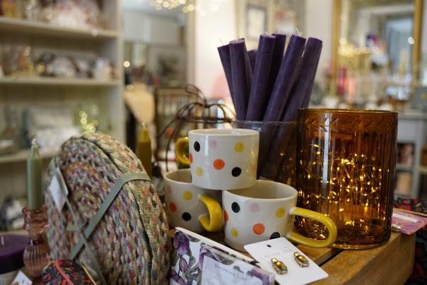 A series of Autumnal products on sale at Follie placed on a table