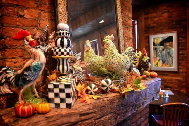 Fireplace mantle with ceramic decorations