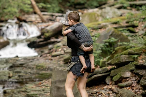 Woman and son walking in nature