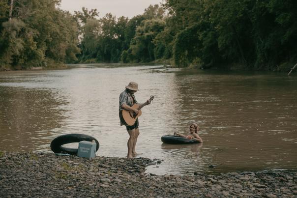 Playing Guitar by Genesee