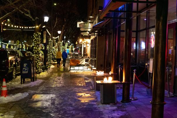 People walking in Downtown Longmont during the Holidays
