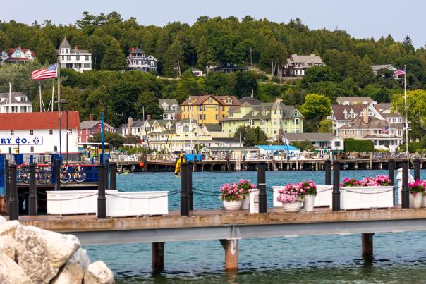 How far in advance should I book my stay on Mackinac Island?