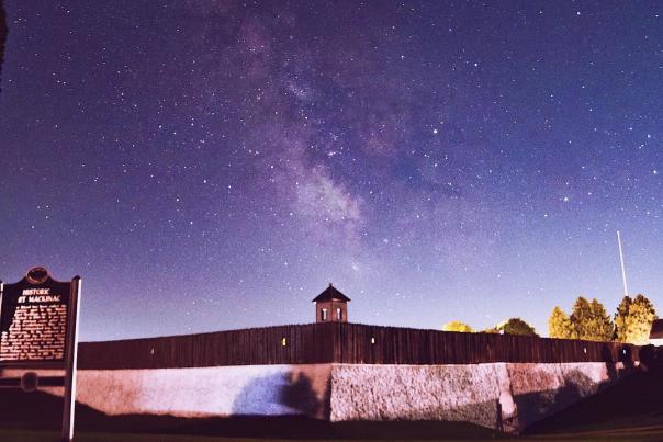 The Milky Way galaxy is visible in the night sky above Mackinac Island’s Fort Mackinac
