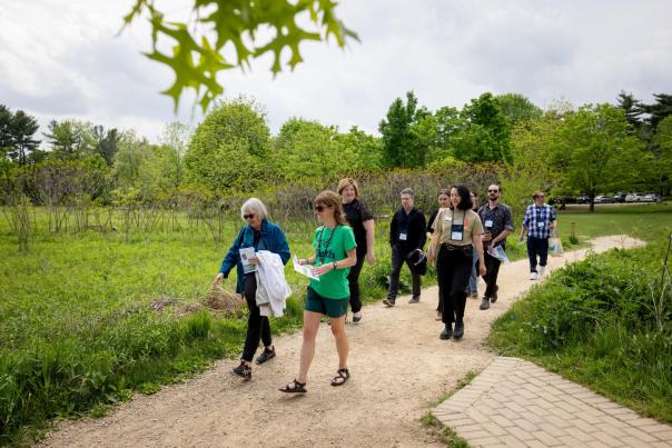 Environmental group walking on path at Aldo Leopold Nature Center