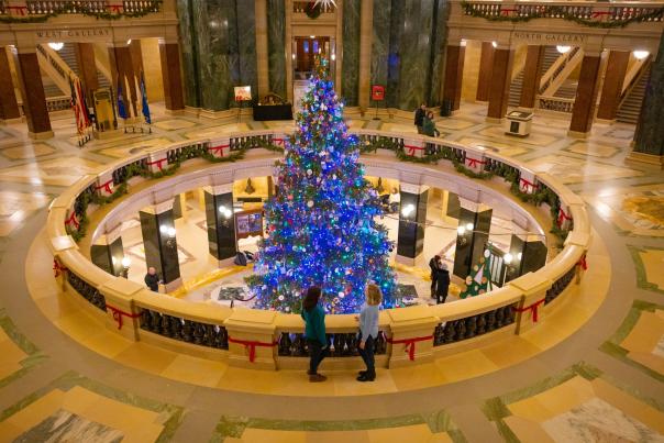 A view from above of the lit up holiday tree in the Wisconsin State Capitol rotunda