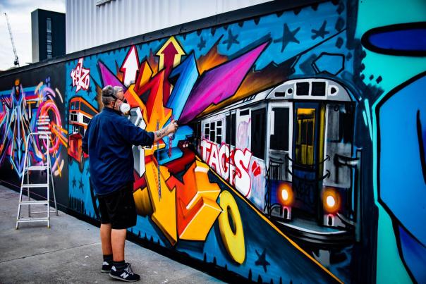 Mancunian Spray Back for Second Charity Street Festival 