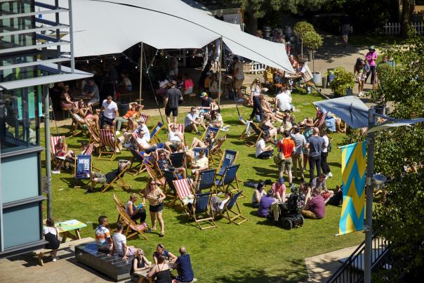 We Invented the Weekend Festival - attendees relaxing in the sun on deckchairs