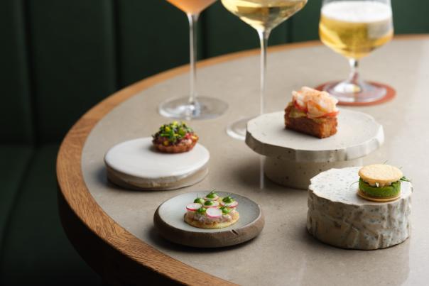 Beautifully presented table of small plates at SKOF