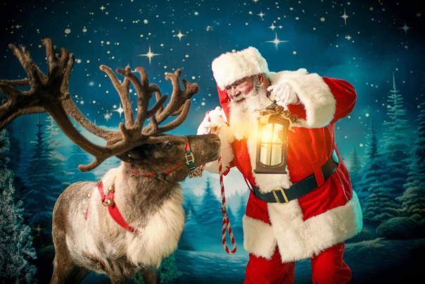 Santa with a reindeer and lantern
