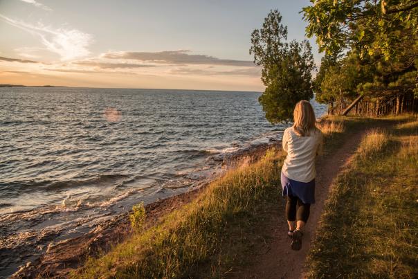 Sunset hike along Lake Superior at Presque Isle Park, Marquette, Michigan.