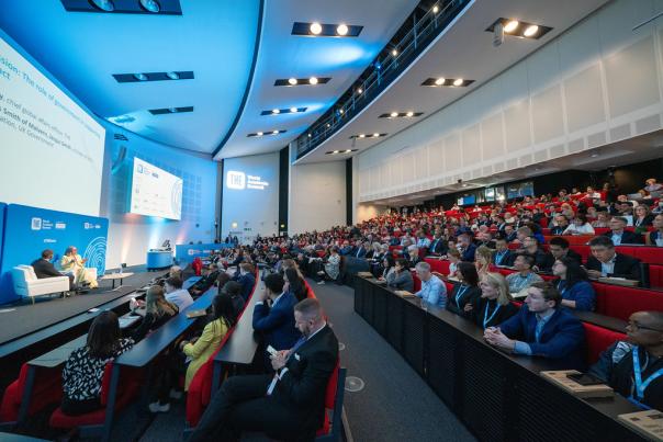 University lecture theatre full of conference delegates