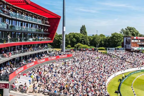Cricket stand with people watching cricket match