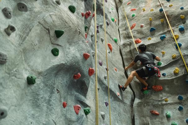 Man using a climbing wall