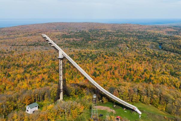 Aerial shot of fall color at Copper Peak, a ski flying hill located in the Upper Peninsula