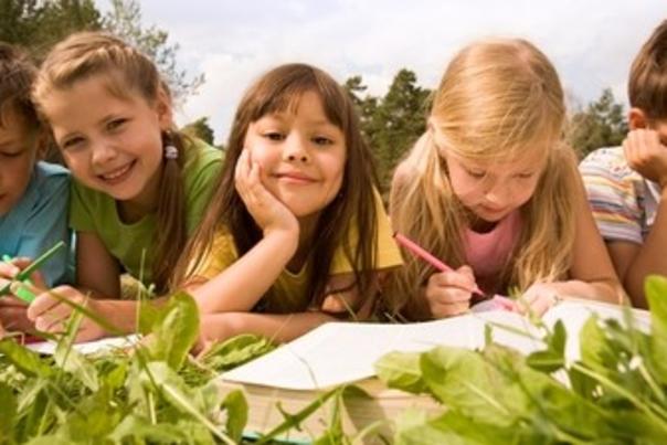 Kids learning in grass