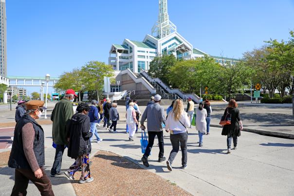 crowd walking down the street