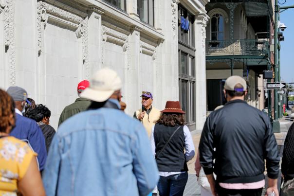 Group of people walking downtown Mobile