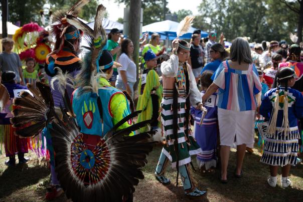 Group of people dressed in Native American clothing