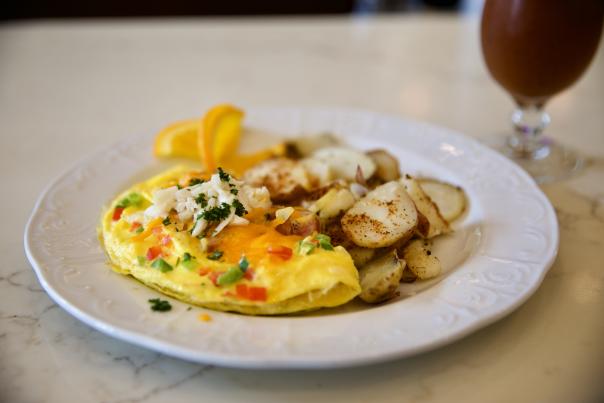 omelet and diced potatoes on a plate