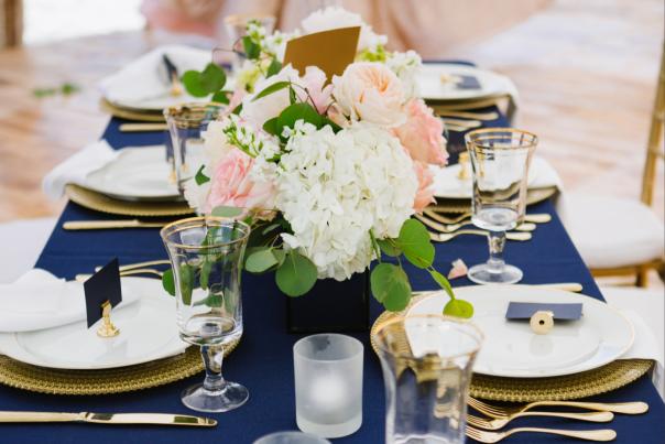 Plate settings, flowers and other table decor