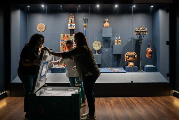 people viewing African artifacts