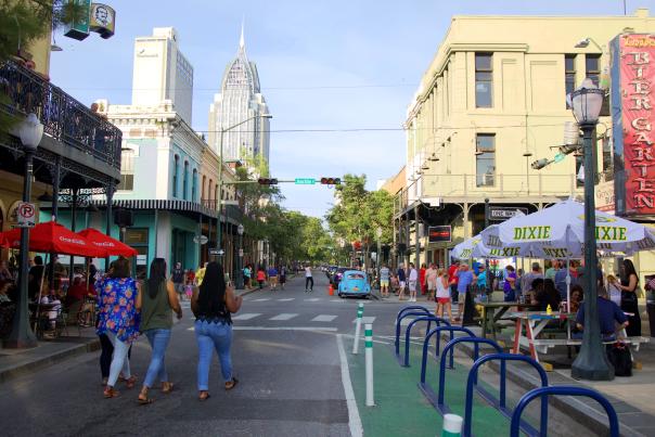 People walking in the street downtown Mobile