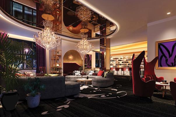 lounge with couches, high back chairs and chandeliers