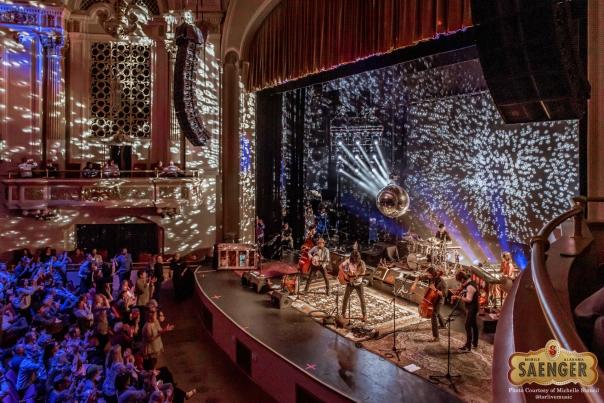 A band performs live on stage at Mobile's Saenger Theater