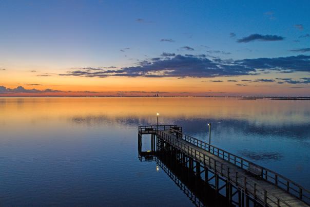 pier and water at sunset