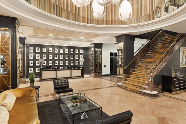 Hotel lobby with couch and stairs