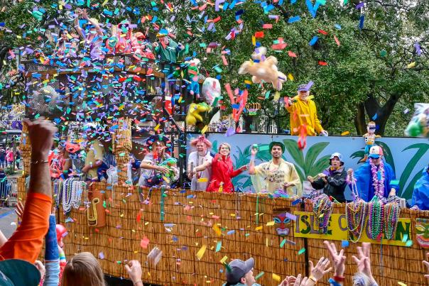 Mardi Gras float and confetti in the air