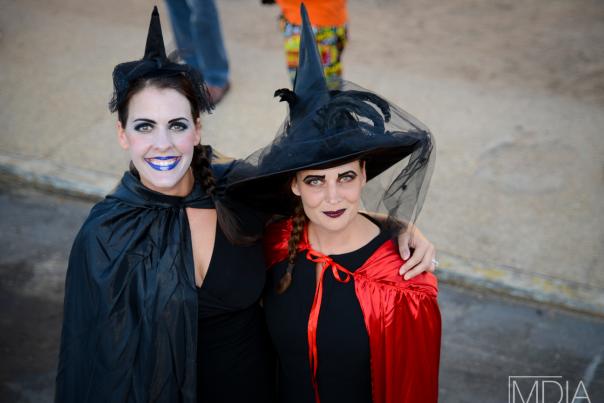 Women dressed up as witches for Halloween