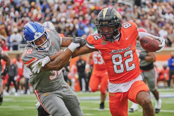 Two men playing football