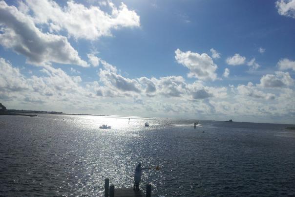 body of water and cloudy sky