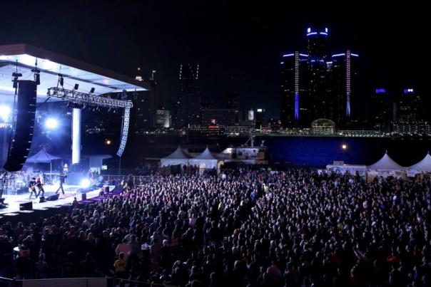 large crowd in front of a stage